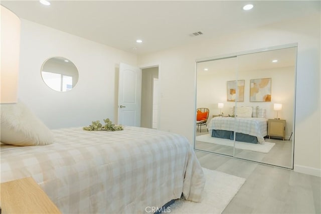 722 W Cully Dr, Orange, CA 92865 - bedroom featuring a closet, recessed lighting, and wood finished floors