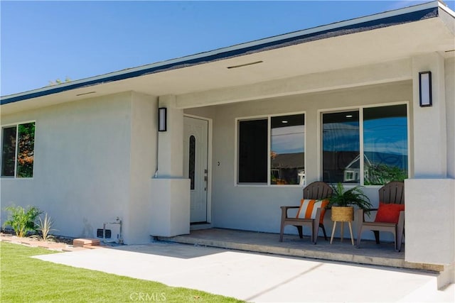 722 W Cully Dr, Orange, CA 92865 - doorway to property with stucco siding