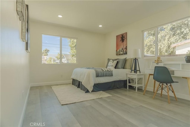 722 W Cully Dr, Orange, CA 92865 - bedroom featuring wood finished floors and recessed lighting