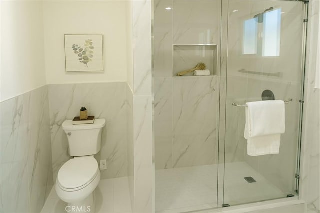 722 W Cully Dr, Orange, CA 92865 - full bath with a marble finish shower, tile walls, and a wainscoted wall