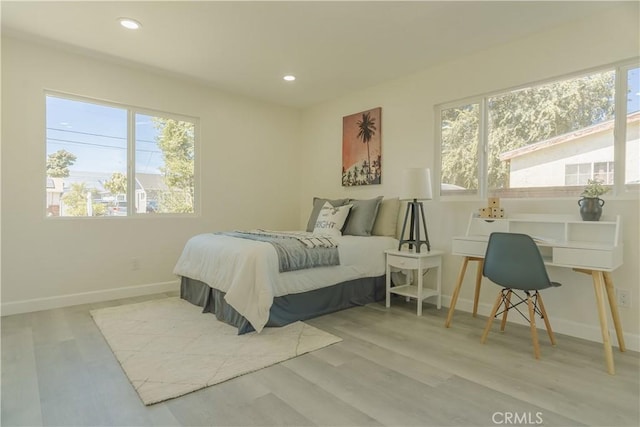 722 W Cully Dr, Orange, CA 92865 - bedroom featuring multiple windows, wood finished floors, and recessed lighting