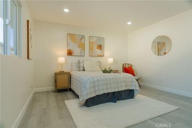 722 W Cully Dr, Orange, CA 92865 - bedroom with light wood-style floors and recessed lighting