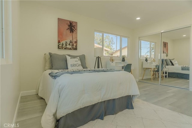 722 W Cully Dr, Orange, CA 92865 - bedroom with wood finished floors, recessed lighting, and a closet