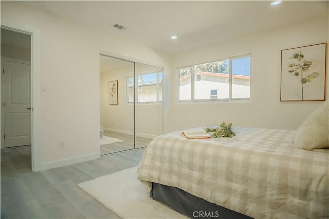 722 W Cully Dr, Orange, CA 92865 - bedroom with wood finished floors, a closet, and recessed lighting