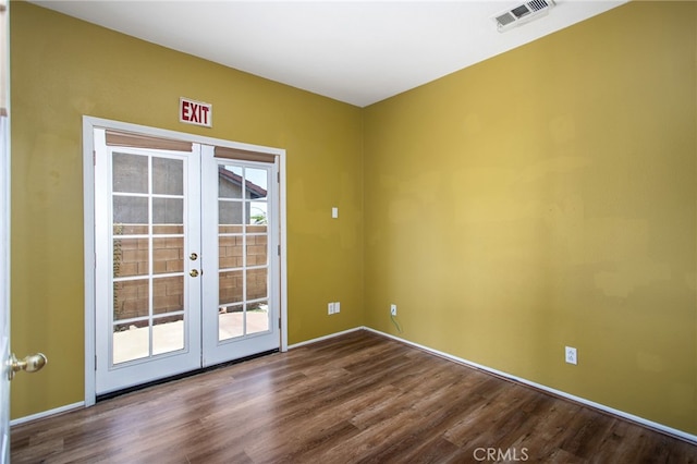 31241 Casera Ct, Menifee, CA 92584 - empty room with french doors and wood finished floors