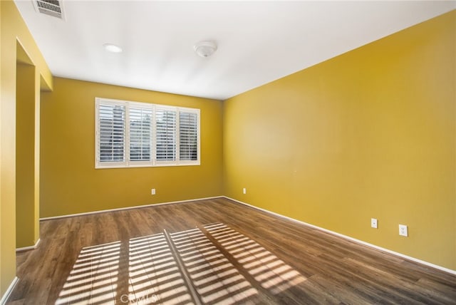 31241 Casera Ct, Menifee, CA 92584 - empty room with wood finished floors and baseboards