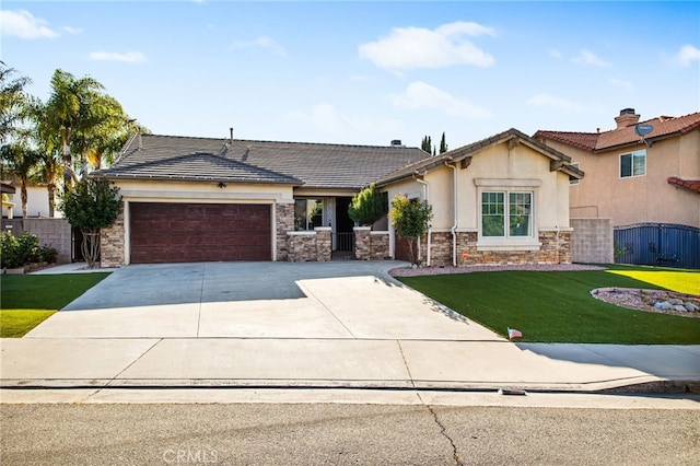 31241 Casera Ct, Menifee, CA 92584 - view of front of home featuring an attached garage, driveway, stone siding, stucco siding, and a tiled roof