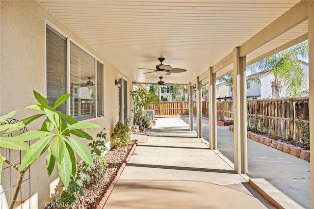 31241 Casera Ct, Menifee, CA 92584 - fenced backyard with a ceiling fan and a patio area