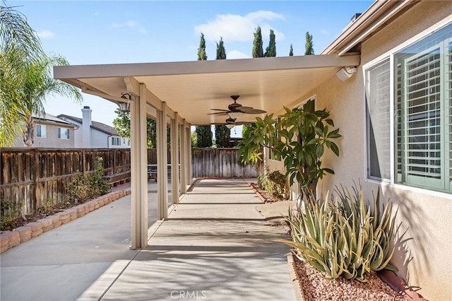 31241 Casera Ct, Menifee, CA 92584 - fenced backyard featuring ceiling fan and a patio