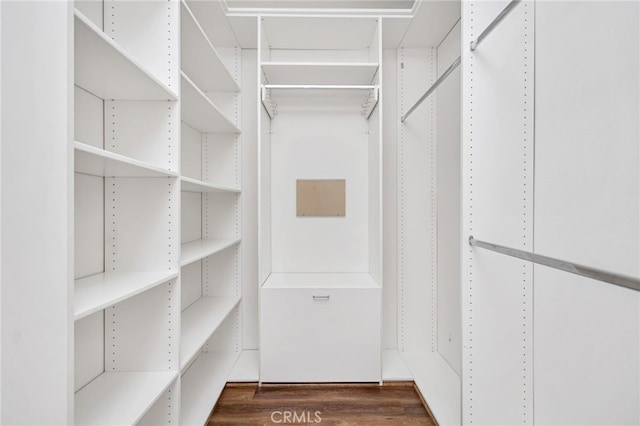 31241 Casera Ct, Menifee, CA 92584 - spacious closet featuring dark wood-type flooring