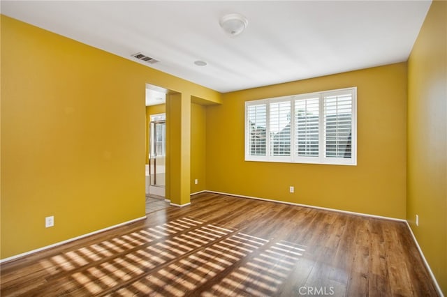 31241 Casera Ct, Menifee, CA 92584 - empty room featuring wood finished floors and baseboards