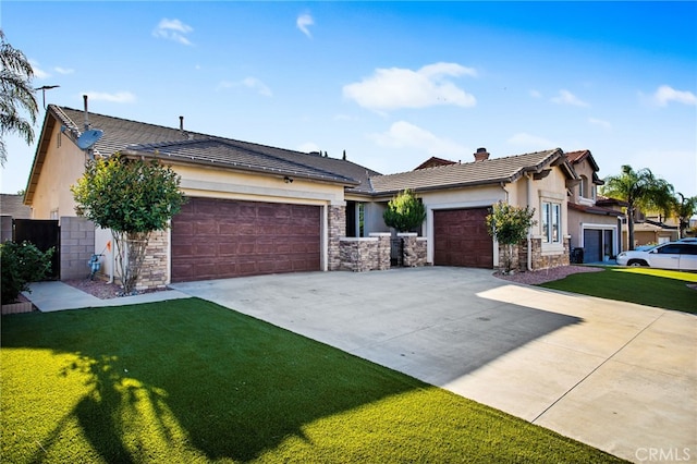 31241 Casera Ct, Menifee, CA 92584 - view of front of home featuring stone siding, stucco siding, an attached garage, driveway, and a front yard