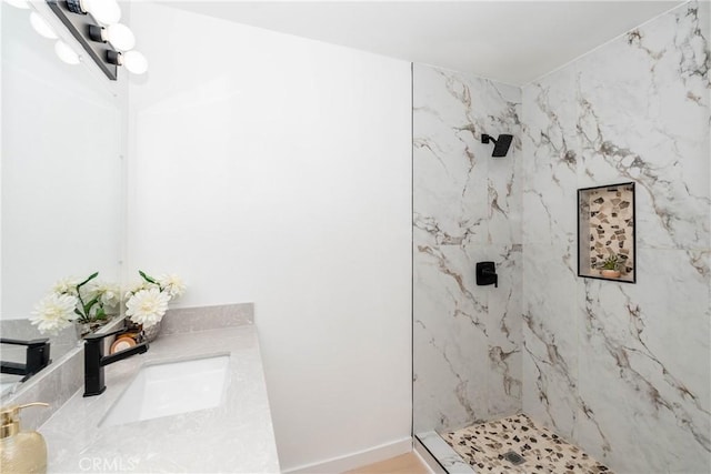 8168 Summerfield Ave, Whittier, CA 90606 - bathroom featuring vanity and a marble finish shower