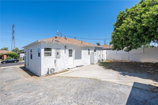 8168 Summerfield Ave, Whittier, CA 90606 - back of property featuring stucco siding and a patio area