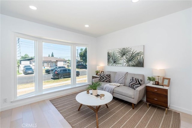 8168 Summerfield Ave, Whittier, CA 90606 - living room with recessed lighting and light wood-style floors