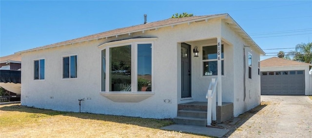 8168 Summerfield Ave, Whittier, CA 90606 - view of property exterior with stucco siding and an outbuilding