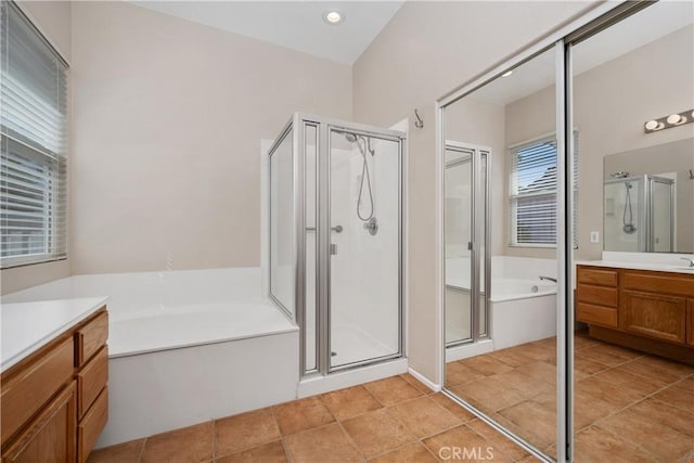 42730 Settlers Rdg, Murrieta, CA 92562 - bathroom featuring vanity, a bath, a shower stall, and tile patterned flooring