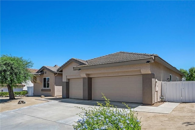 42730 Settlers Rdg, Murrieta, CA 92562 - ranch-style home with a garage, stucco siding, a tile roof, and concrete driveway