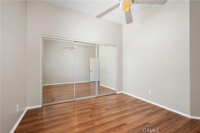 42730 Settlers Rdg, Murrieta, CA 92562 - unfurnished bedroom featuring wood finished floors, a closet, and a ceiling fan