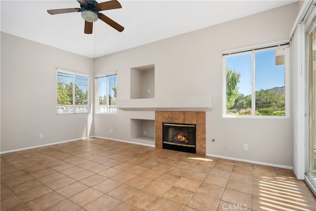 42730 Settlers Rdg, Murrieta, CA 92562 - unfurnished living room with a ceiling fan and a tiled fireplace