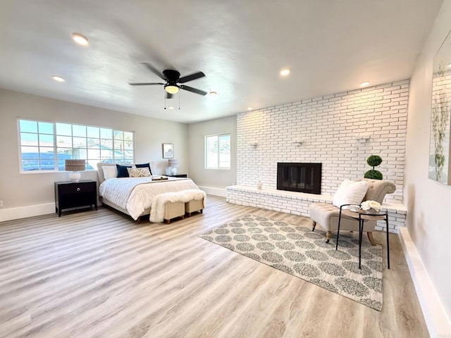 9944 Donner St, Santee, CA 92071 - bedroom featuring wood finished floors, a brick fireplace, recessed lighting, and a ceiling fan