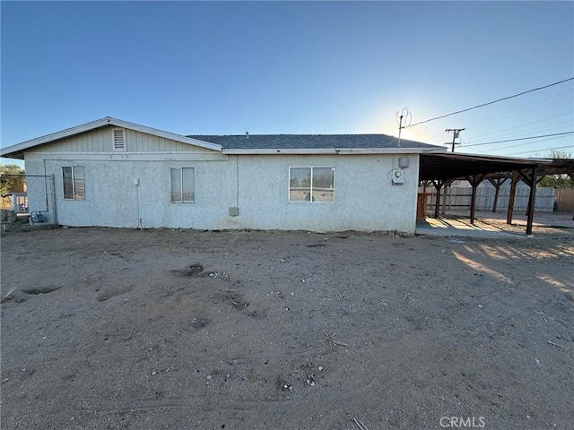 1032 W Coronado Ave, Ridgecrest, CA 93555 - rear view of house with stucco siding