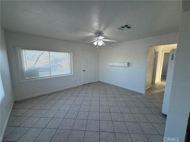 1032 W Coronado Ave, Ridgecrest, CA 93555 - spare room with a ceiling fan and light tile patterned floors