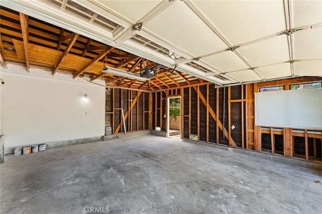 25632 Seaside Dr Unit 140, Dana Point, CA 92629 - garage featuring a garage door opener