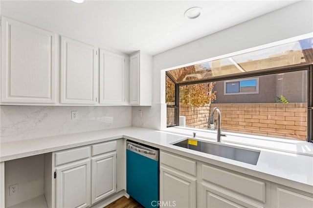 25632 Seaside Dr Unit 140, Dana Point, CA 92629 - kitchen featuring dishwasher, white cabinets, light countertops, tasteful backsplash, and recessed lighting