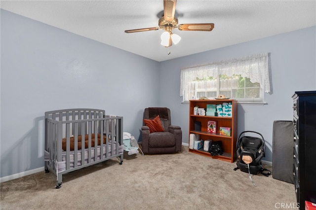 7420 London Ave, Rancho Cucamonga, CA 91730 - bedroom with carpet floors, a crib, and ceiling fan