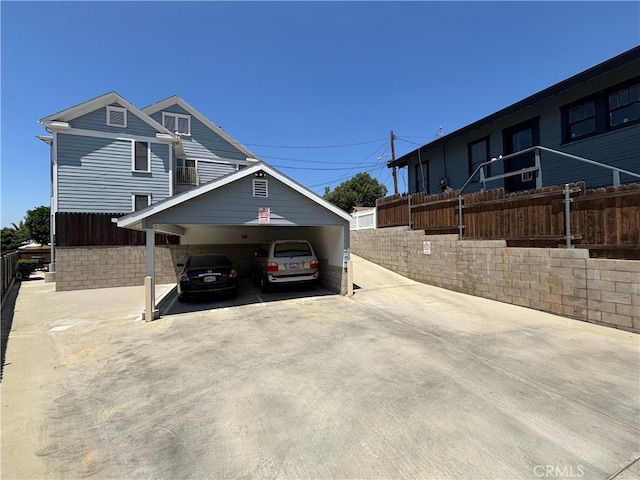 6233 Haviland Ave, Whittier, CA 90601 - exterior space featuring concrete driveway and a carport
