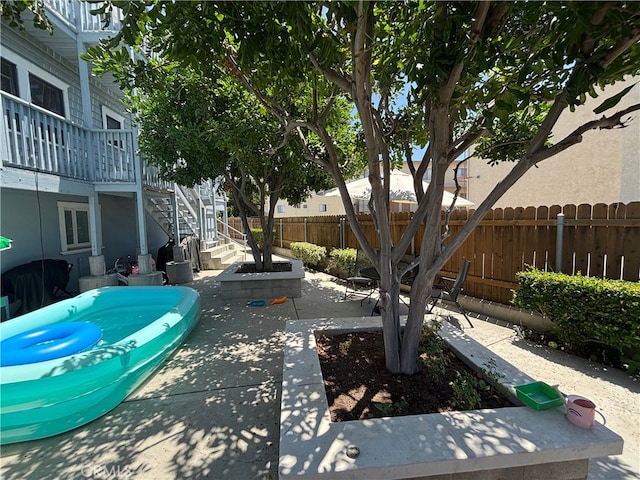 6233 Haviland Ave, Whittier, CA 90601 - surrounding community with a patio and stairs