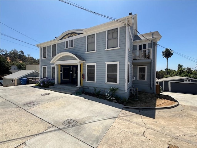 6233 Haviland Ave, Whittier, CA 90601 - view of front of home with a balcony and an outdoor structure
