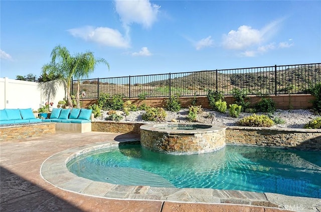 11905 Flicker Cv, Corona, CA 92883 - view of swimming pool with a fenced backyard, a pool with connected hot tub, and a patio area