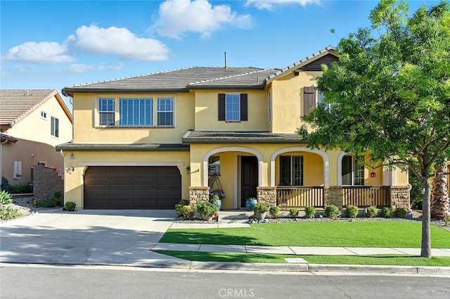 11905 Flicker Cv, Corona, CA 92883 - view of front of house with covered porch, stucco siding, concrete driveway, an attached garage, and a front lawn