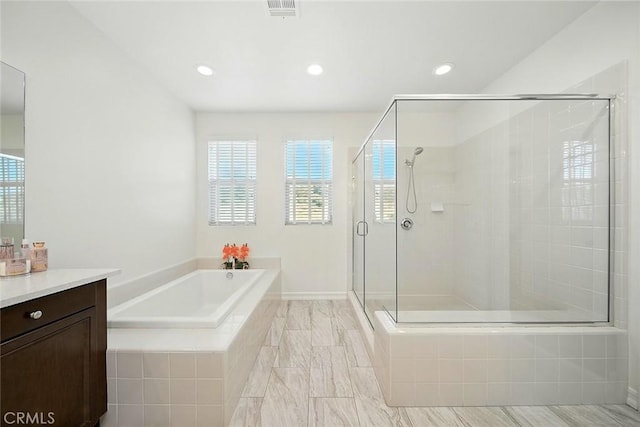 11905 Flicker Cv, Corona, CA 92883 - full bath featuring a bath, a shower stall, vanity, and recessed lighting