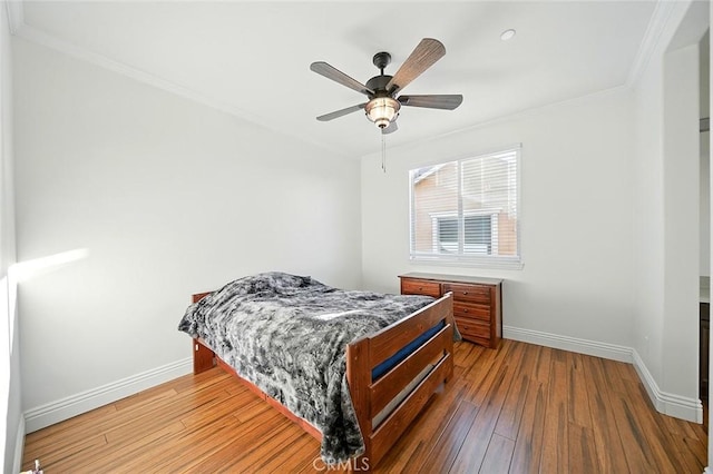 11905 Flicker Cv, Corona, CA 92883 - bedroom with ornamental molding, wood finished floors, and a ceiling fan