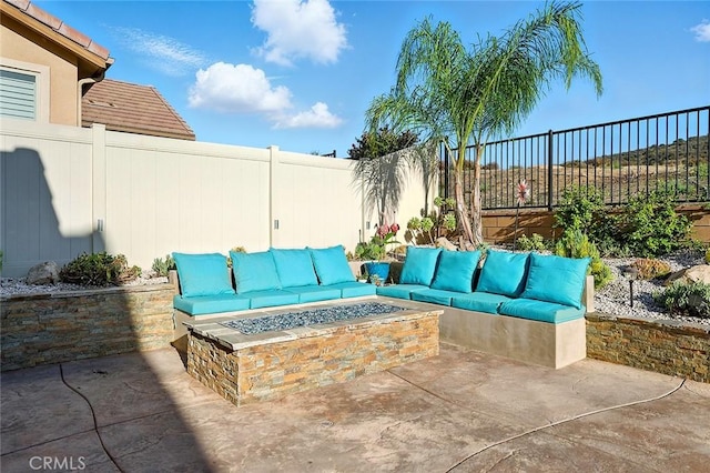 11905 Flicker Cv, Corona, CA 92883 - fenced backyard featuring an outdoor living space with a fire pit and a patio
