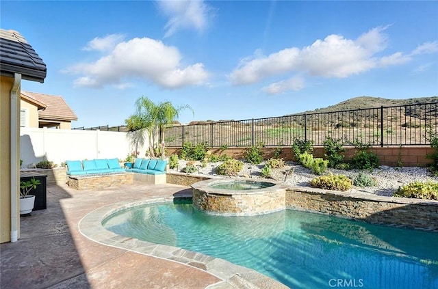 11905 Flicker Cv, Corona, CA 92883 - view of pool featuring a fenced backyard, a pool with connected hot tub, and a patio