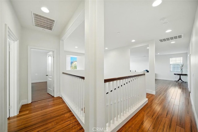 11905 Flicker Cv, Corona, CA 92883 - hallway with an upstairs landing, hardwood / wood-style floors, and recessed lighting