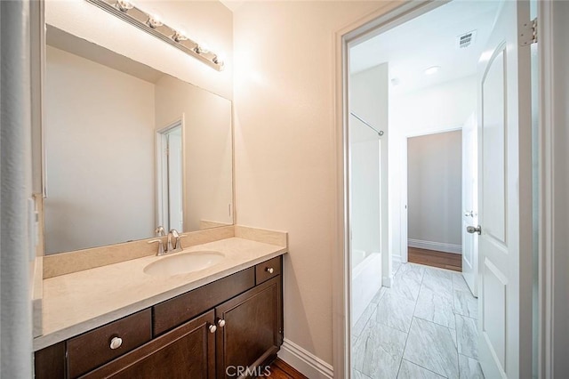 11905 Flicker Cv, Corona, CA 92883 - full bath with vanity, marble finish flooring, and bathtub / shower combination