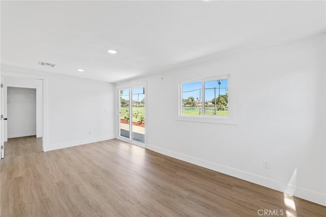 22959 Vought St, Moreno Valley, CA 92553 - spare room with light wood finished floors and recessed lighting