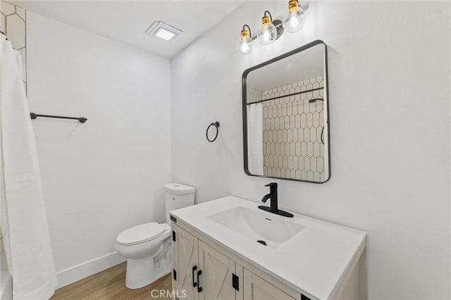 22959 Vought St, Moreno Valley, CA 92553 - full bath with vanity, wood finished floors, and curtained shower