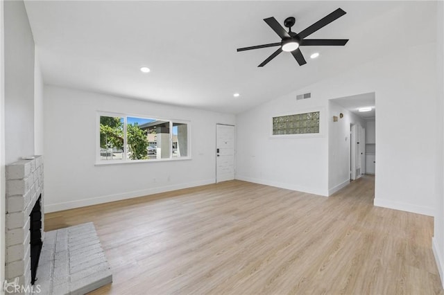 22959 Vought St, Moreno Valley, CA 92553 - unfurnished living room featuring ceiling fan, vaulted ceiling, a fireplace, light wood-type flooring, and recessed lighting