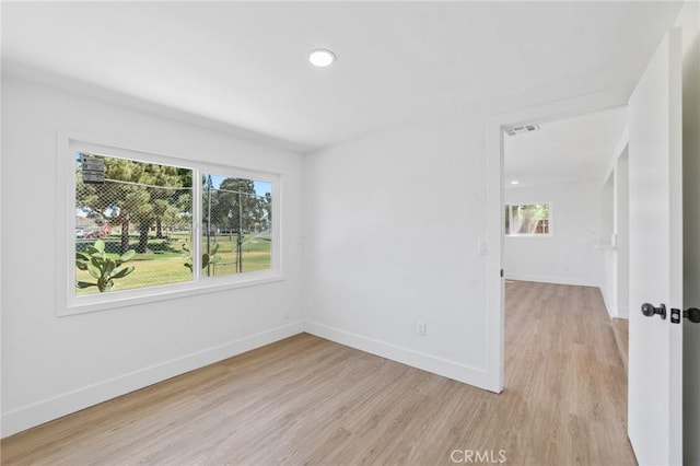 22959 Vought St, Moreno Valley, CA 92553 - spare room featuring healthy amount of natural light, light wood finished floors, and recessed lighting