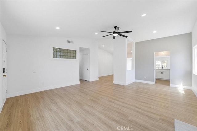 22959 Vought St, Moreno Valley, CA 92553 - unfurnished living room with ceiling fan, light wood-type flooring, recessed lighting, and lofted ceiling