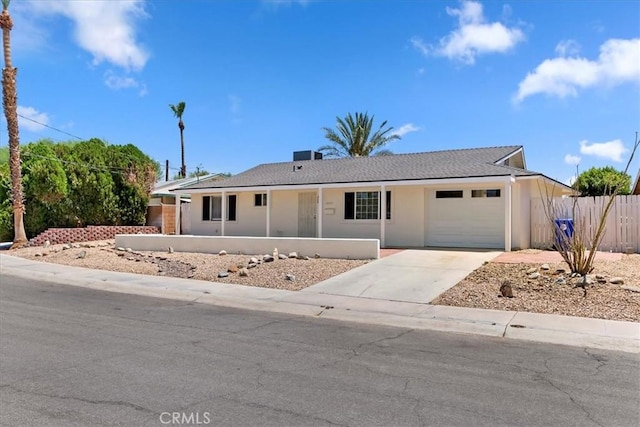 43000 Connecticut St, Palm Desert, CA 92211 - ranch-style house featuring concrete driveway, a garage, and stucco siding