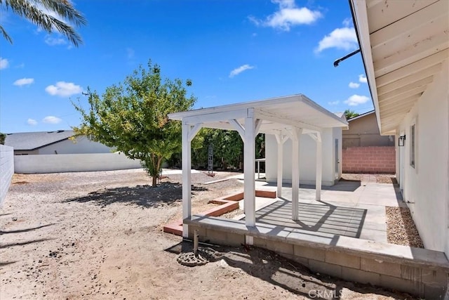 43000 Connecticut St, Palm Desert, CA 92211 - fenced backyard with a patio and a gazebo