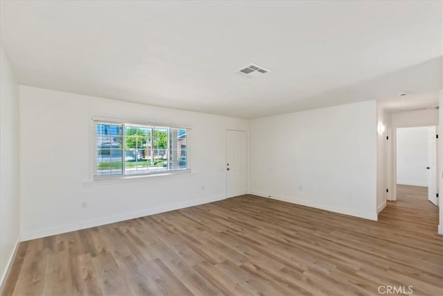 43000 Connecticut St, Palm Desert, CA 92211 - spare room with light wood-style flooring and baseboards