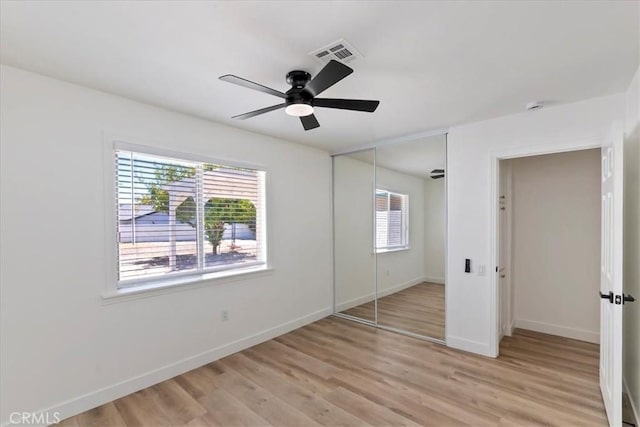 43000 Connecticut St, Palm Desert, CA 92211 - unfurnished bedroom with light wood-style floors, a closet, and a ceiling fan